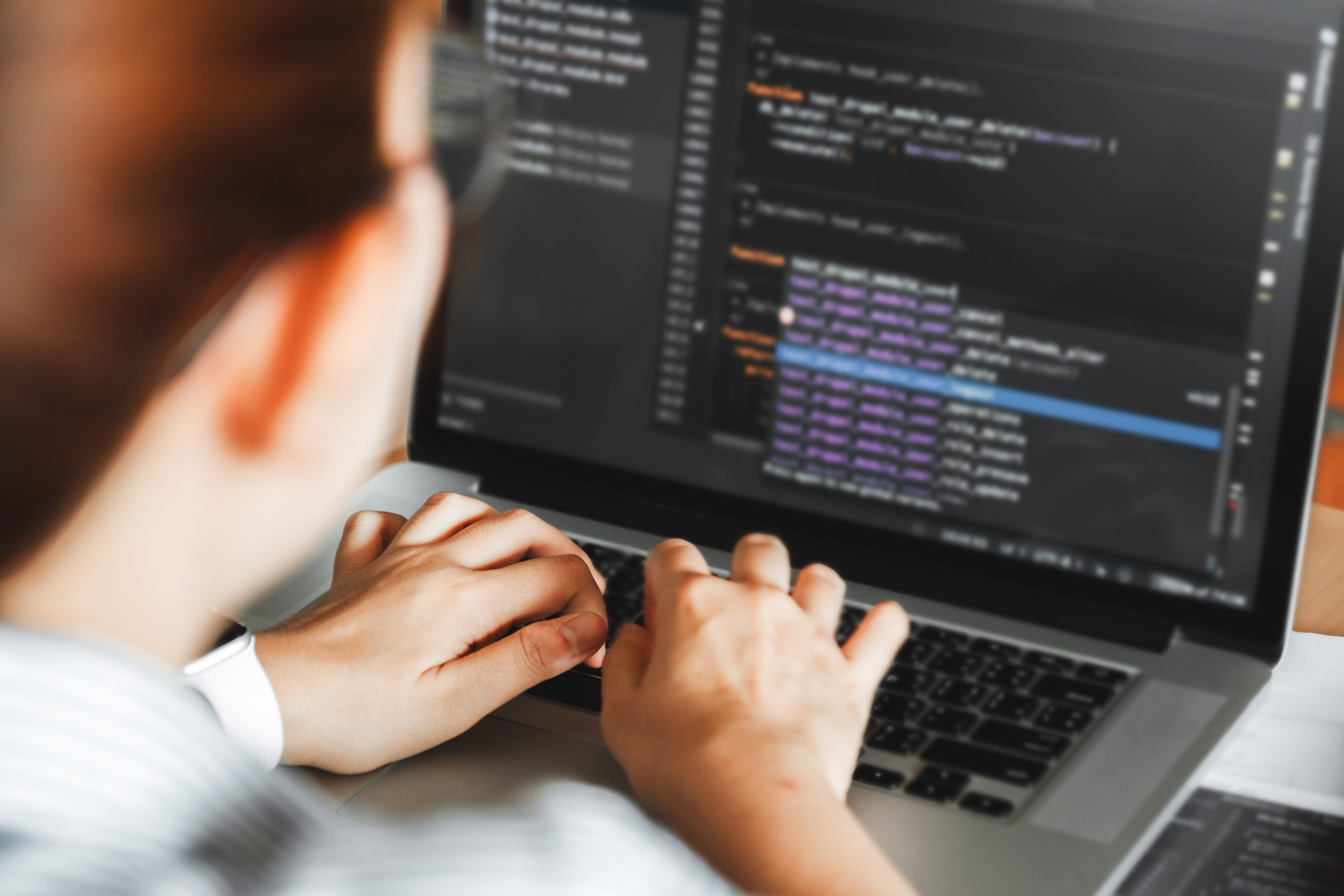 Developing programmer team reading computer codes Development We